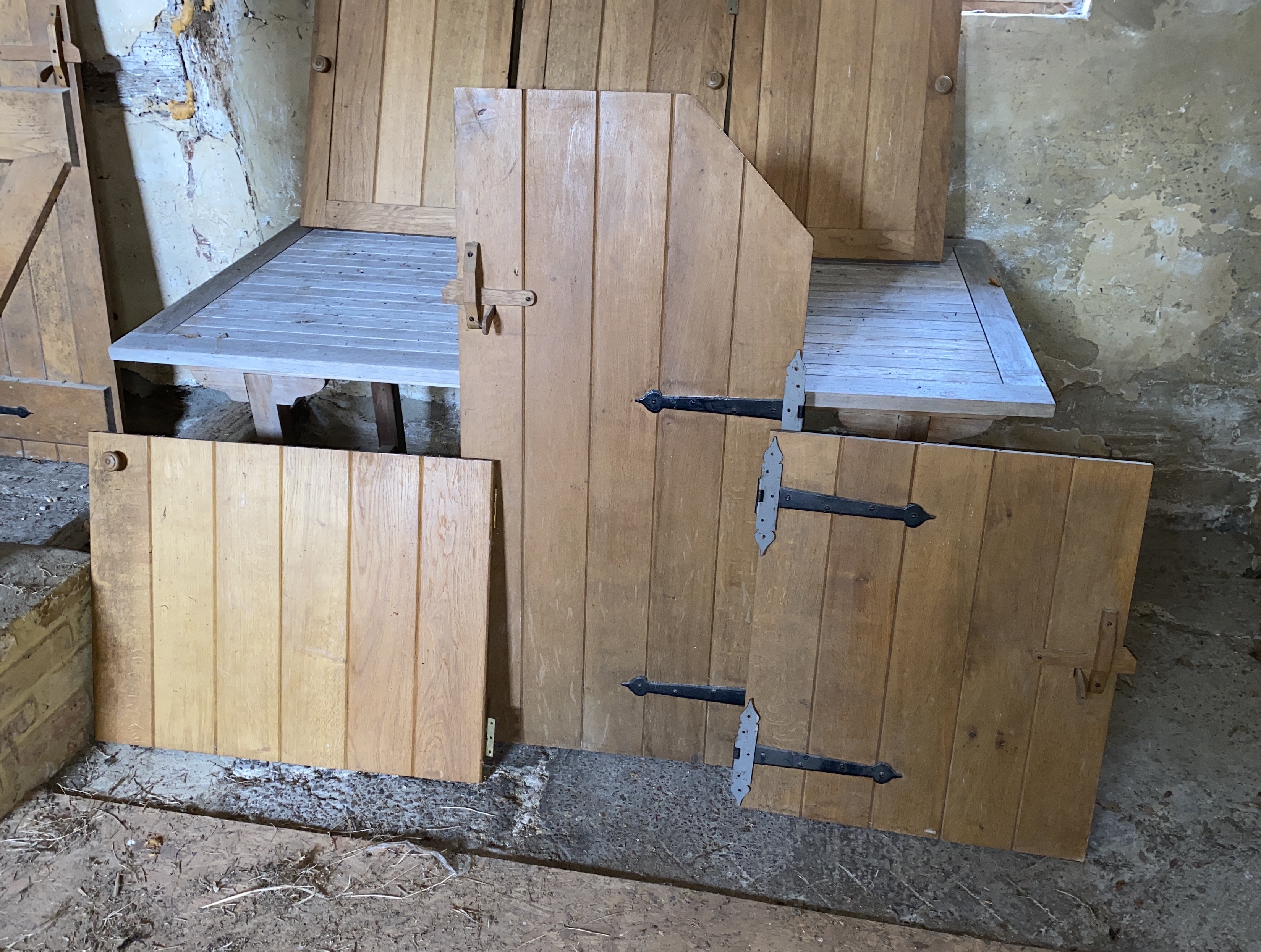 Six solid oak cupboard doors, consisting of three 72 x 52cm; one 73 x 63cm; one 82 x 63.5cm and another, with a canted side, 125 x 62.5cm